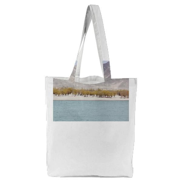 Brown Leaves Trees Near Brown Mountain During Daytime Tote Bag