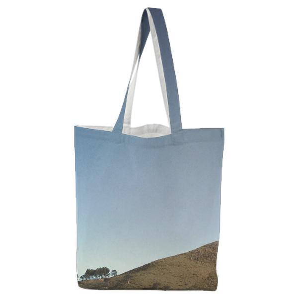 Trees Near Mountain Under Blue Sky Tote Bag