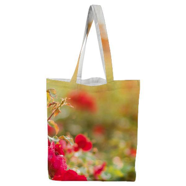 Red Petaled Flower During Daytime Tote Bag