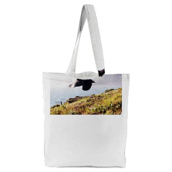 2 Eagle Near Green Grass And Cliff During Daytime Tote Bag