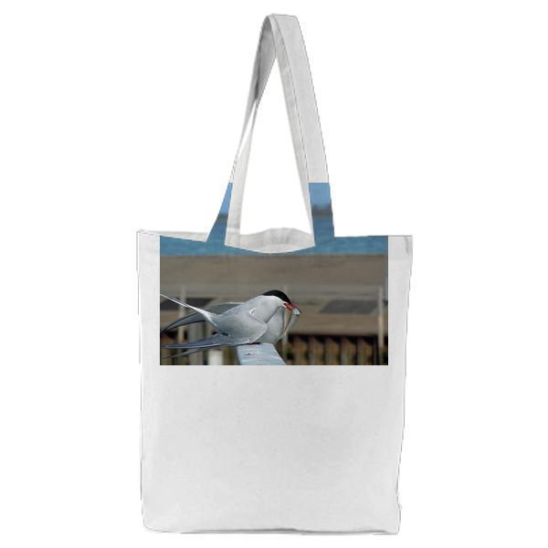 Grey Black Feathered Bird Perched On Pole Tote Bag