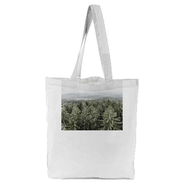 Pine Trees Above White Clouds During Daytime Tote Bag