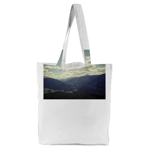 Black Mountain Range Under Gray Cloudy Sky During Daytime Tote Bag