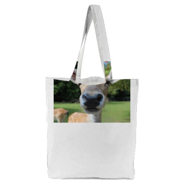Close Up Photography Of Brown Animal Tote Bag