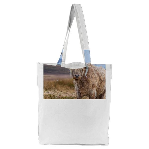 Tilt Shift Photography Of Brown With Horns Legged Animal At Daytime Tote Bag
