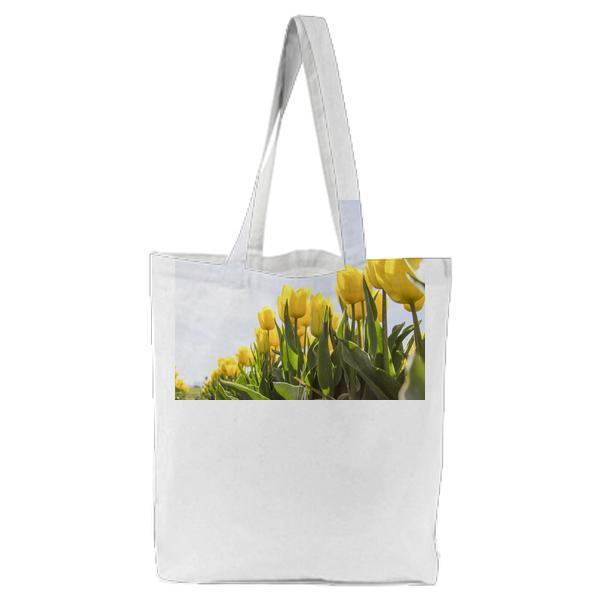 Yellow Tulip Flower Field During Daytime Tote Bag