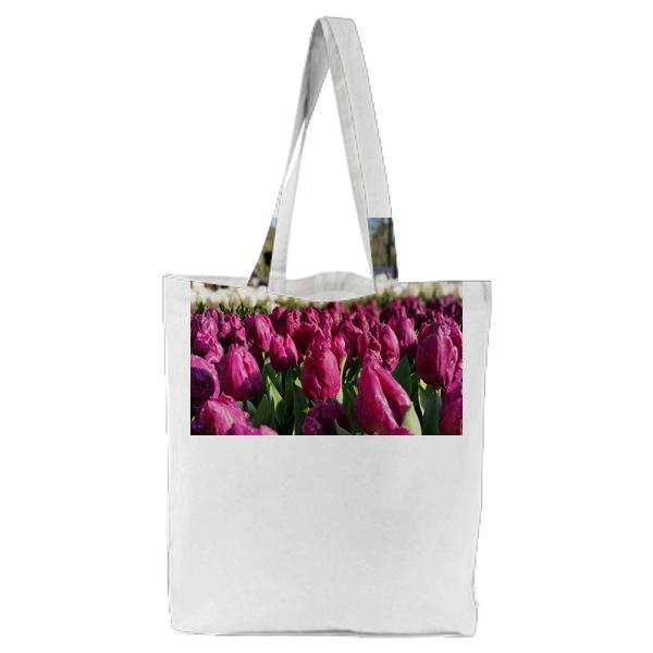 White And Red Flower Bed During Daytime Tote Bag