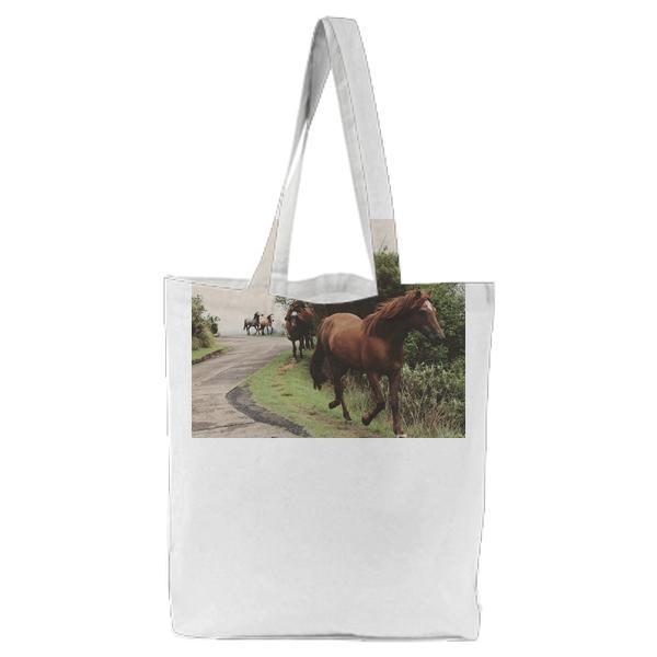 Brown Horse Near Green Grass And Tree During Daytime Tote Bag