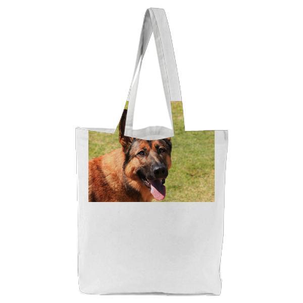 CloseUp Portrait Of Dog On Field Tote Bag