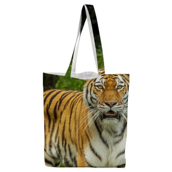 Tiger In Green Grass Near The Tree During Daytime Tote Bag