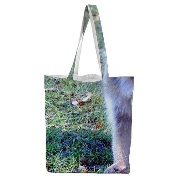 Brown Monkey On Green Grass During Daytime Tote Bag
