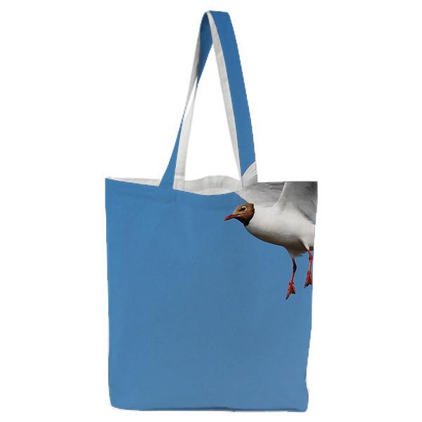 White Bird Flying Above Blue Skies During Daytime Tote Bag