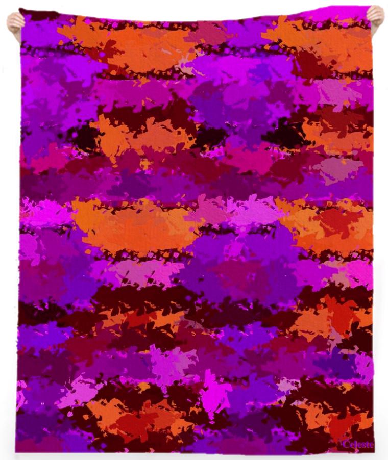 Splatters of purple and orange beach towel