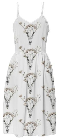 Deer skull in white dress